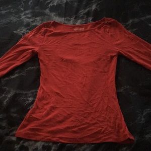 red long sleeve shirt with shoulder buttons